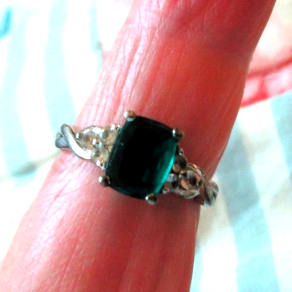 Size 7 emerald and diamond ring.. 935 sterling silver